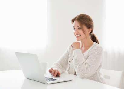 Woman entrepreneur at laptop